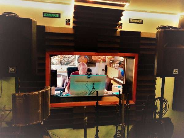 Ian Housley working on mastering tracks in the studio